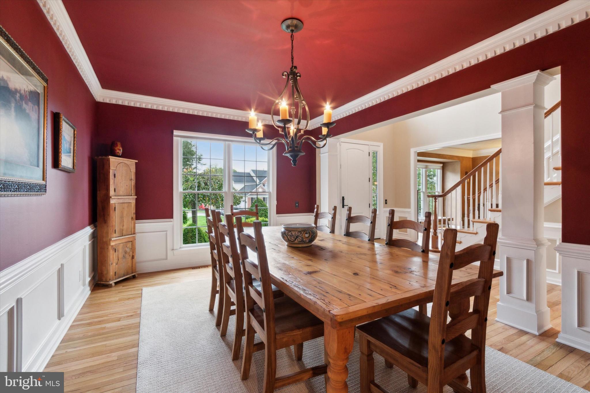 1007 Ridgehaven Road West Chester, PA 19382 - Photo 6 of 36 a view of a dining room with furniture window and wooden floor