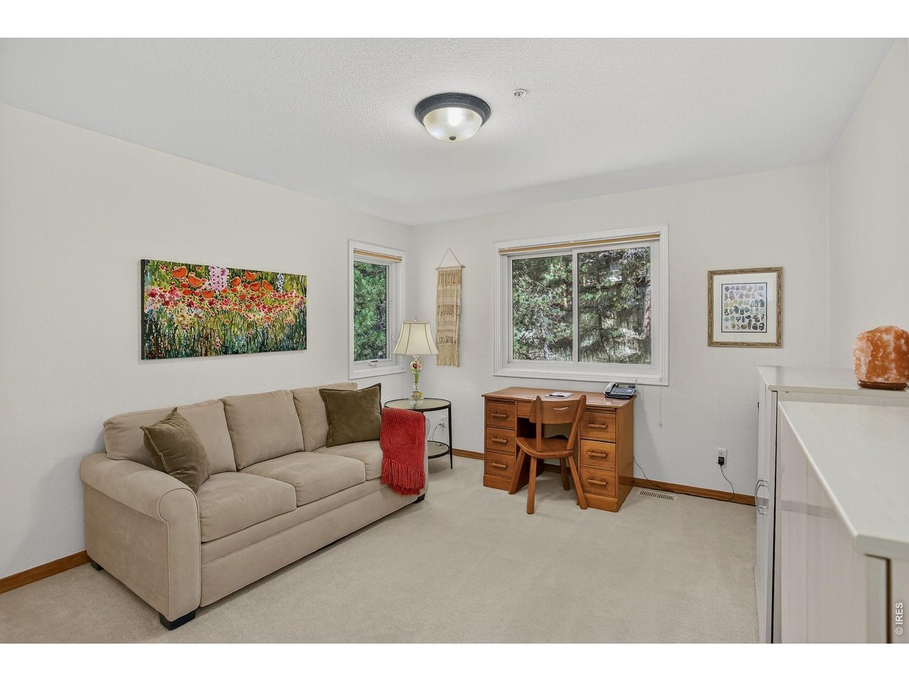 65 Betasso Road Boulder, CO 80302 - Photo 26 of 38 a living room with furniture and a flat screen tv