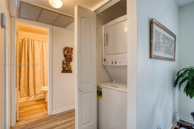 a view of a hallway with a elevator and a window