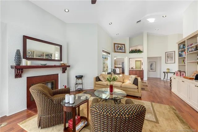 a living room with furniture or couch and a fireplace