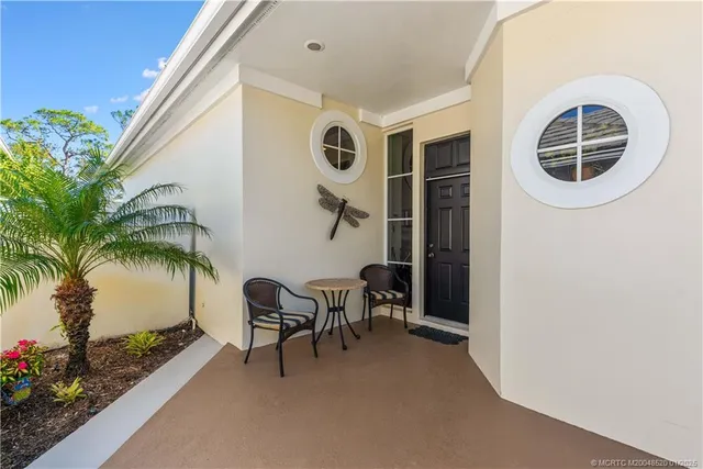 a view of livingroom with furniture and garden