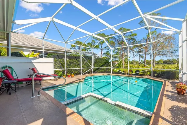 deck with table and chairs