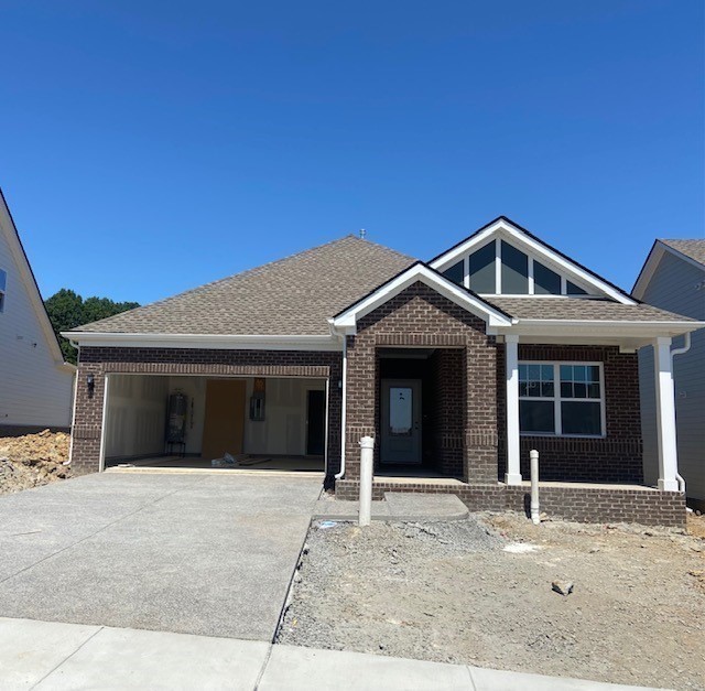 207 Goldfinch Rd Mount Mount Juliet, TN 37122 - Photo 1 of 20 a front view of a house with a yard