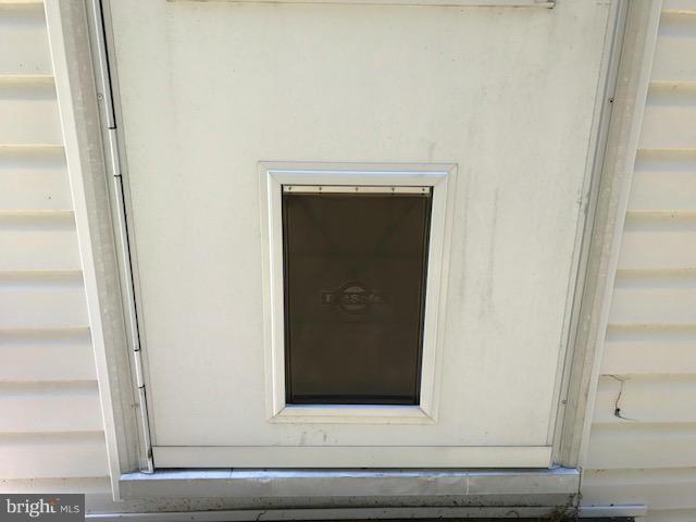 16428 Forrest Road King George, VA 22485 - Photo 21 of 23 Attached "Doggie" Door to Back Storm Door