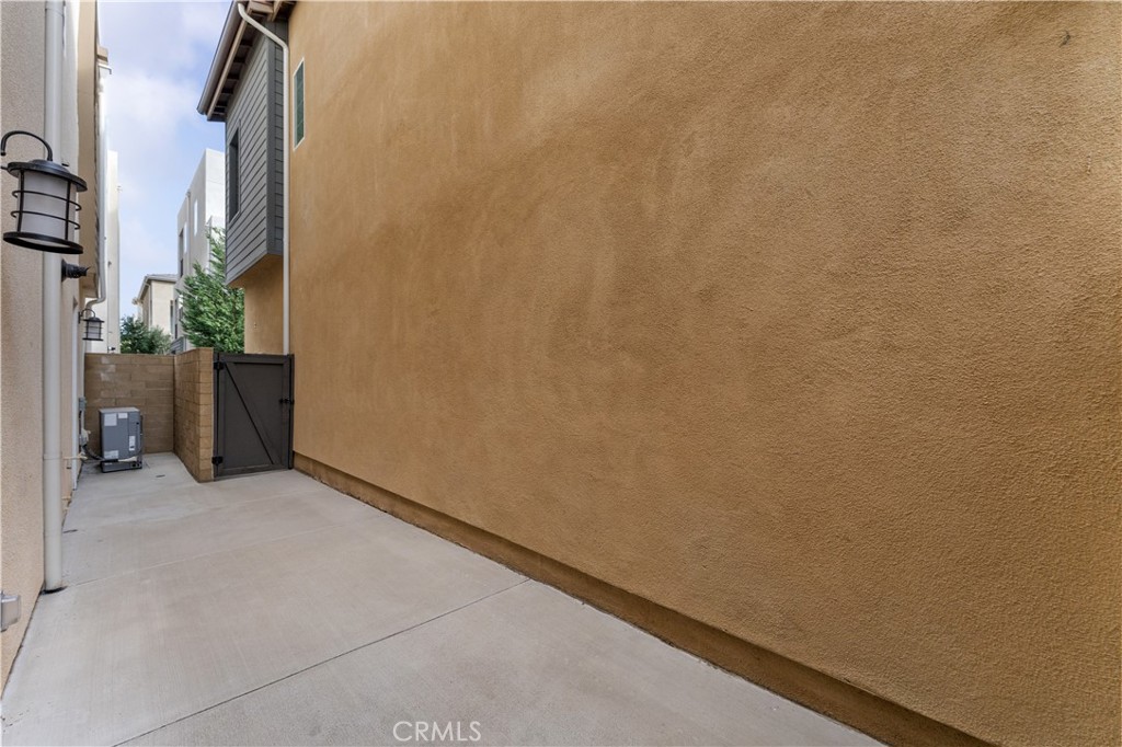 115 Rondo Irvine, CA 92618 - Photo 20 of 28 a view of a room with a door