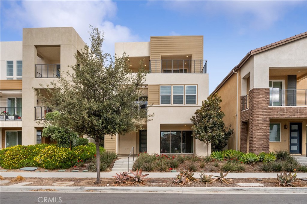 115 Rondo Irvine, CA 92618 - Photo 2 of 28 a front view of a multi story building