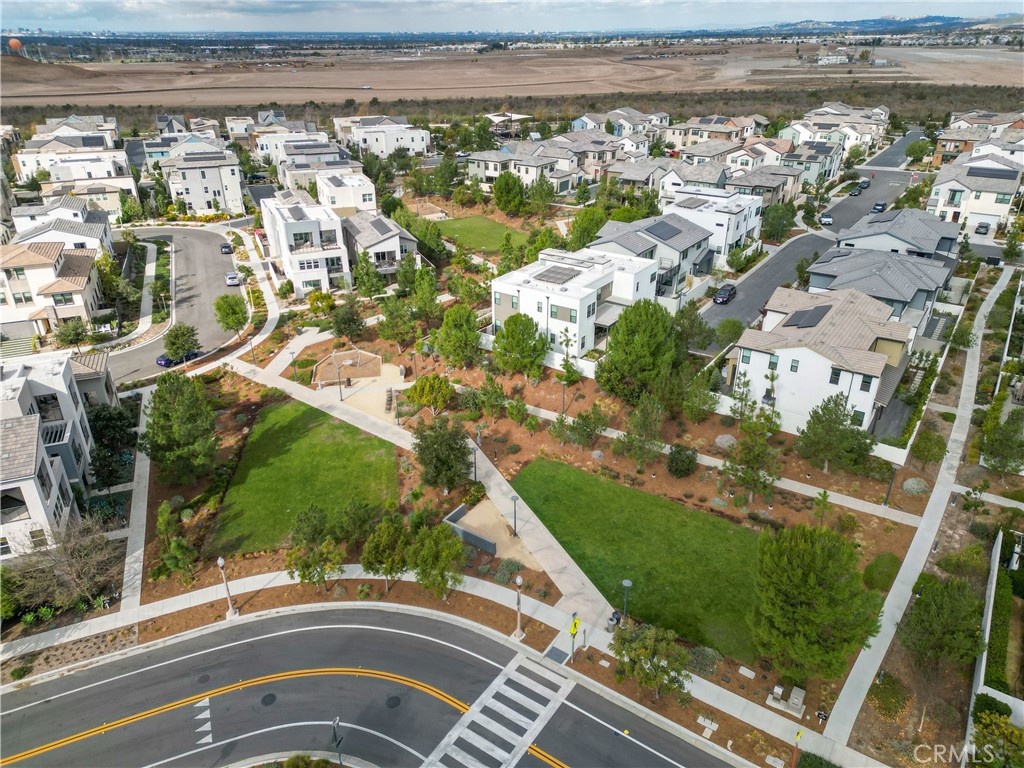 115 Rondo Irvine, CA 92618 - Photo 26 of 28 an aerial view of residential houses with outdoor space