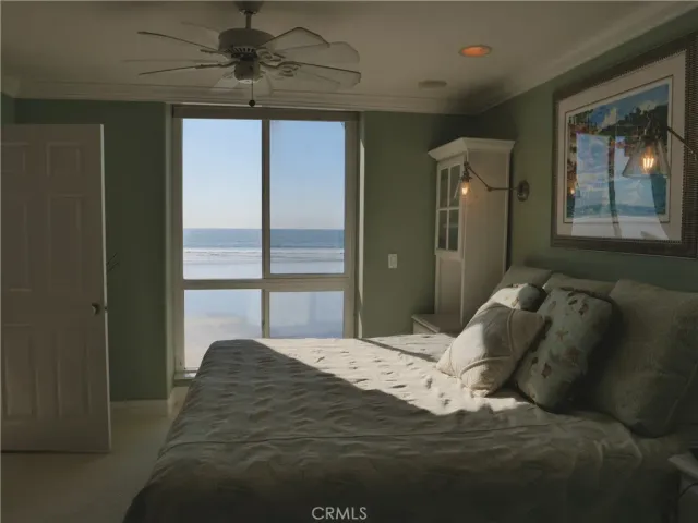 a bathroom with a granite countertop sink a mirror and shower