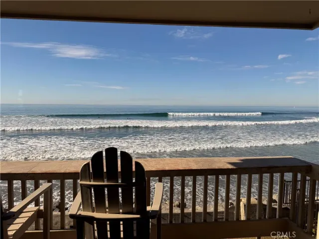 a view of a living room and kitchen
