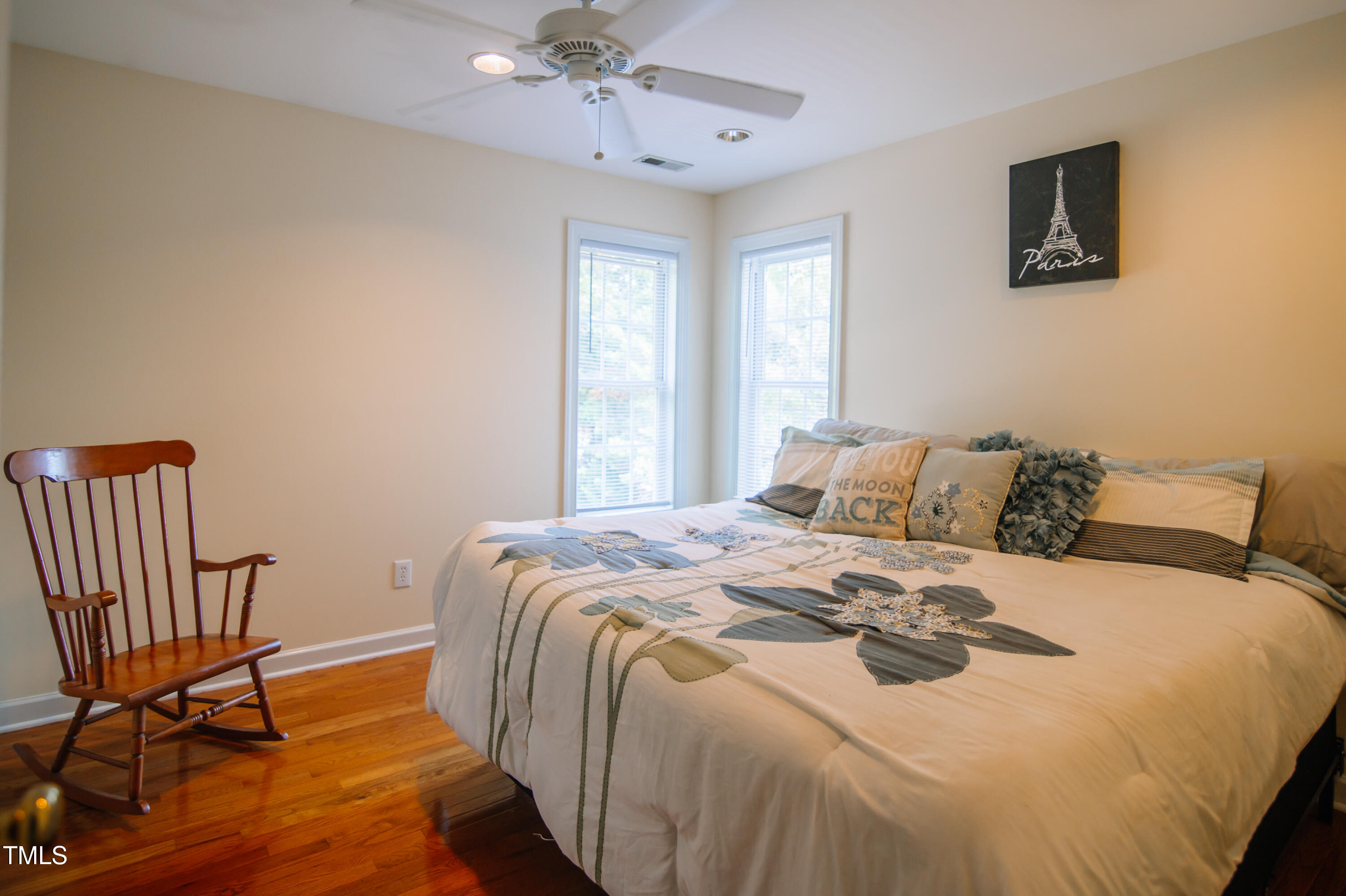 12223 Penrose Trail Raleigh, NC 27614 - Photo 15 of 21 a bed sitting in a bedroom and a chair