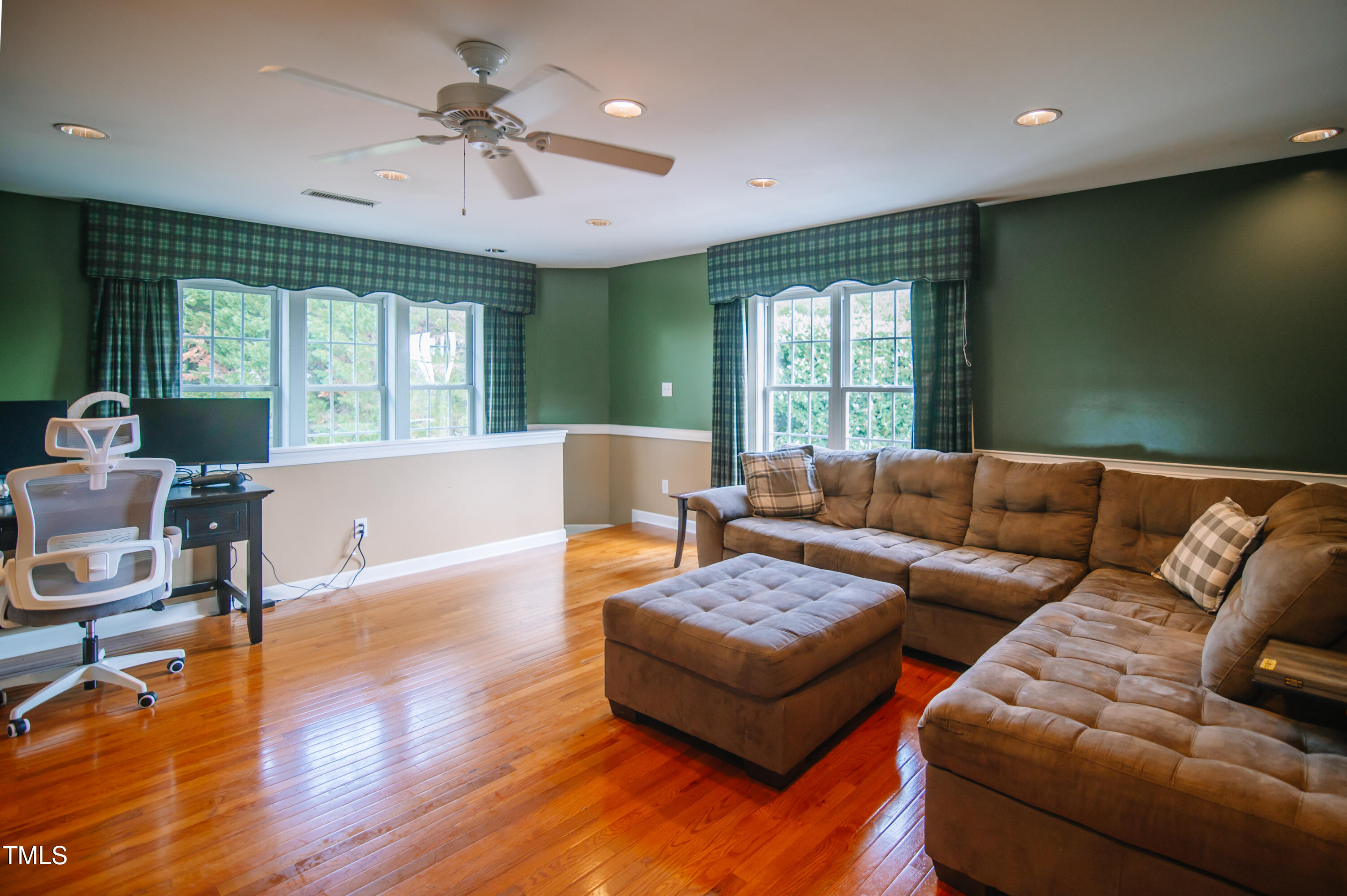 12223 Penrose Trail Raleigh, NC 27614 - Photo 17 of 21 a living room with furniture and a large window