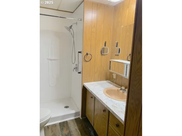 a bathroom with a sink and a shower