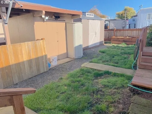 a view of a backyard with plants