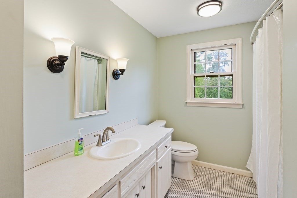 17 Bittersweet Lane Wilbraham, MA 01095 - Photo 29 of 40 a bathroom with a sink vanity granite and toilet