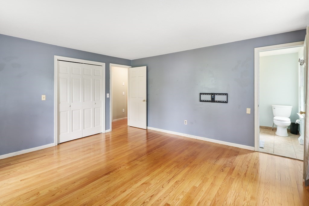 17 Bittersweet Lane Wilbraham, MA 01095 - Photo 34 of 40 a view of empty room with wooden floor