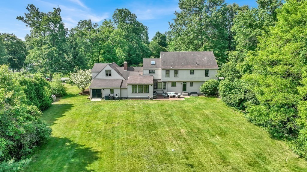 17 Bittersweet Lane Wilbraham, MA 01095 - Photo 7 of 40 a aerial view of a house with a big yard plants and large trees