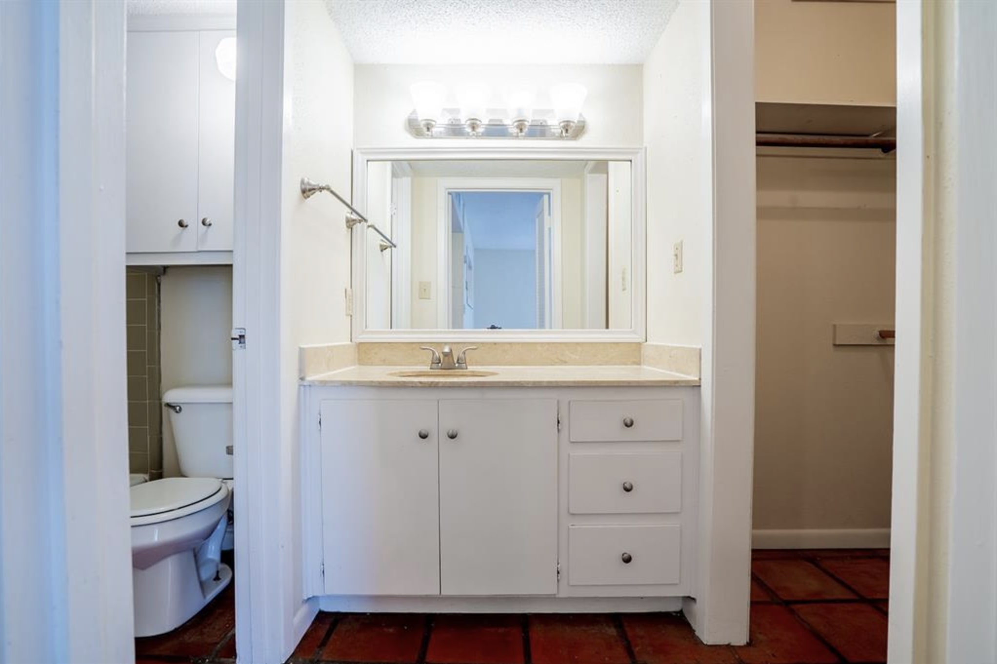 110 East 37th Street, Unit 103 Austin, TX 78705 - Photo 8 of 12 a bathroom with a sink and a mirror