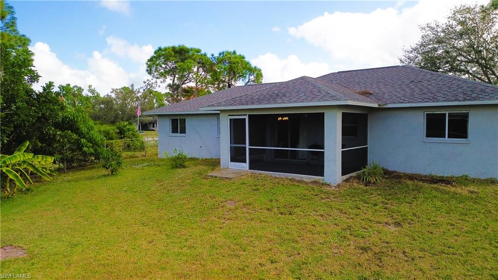 18282 Fern Road Fort Myers, FL 33967 - Photo 23 of 24 a view of a house with a yard