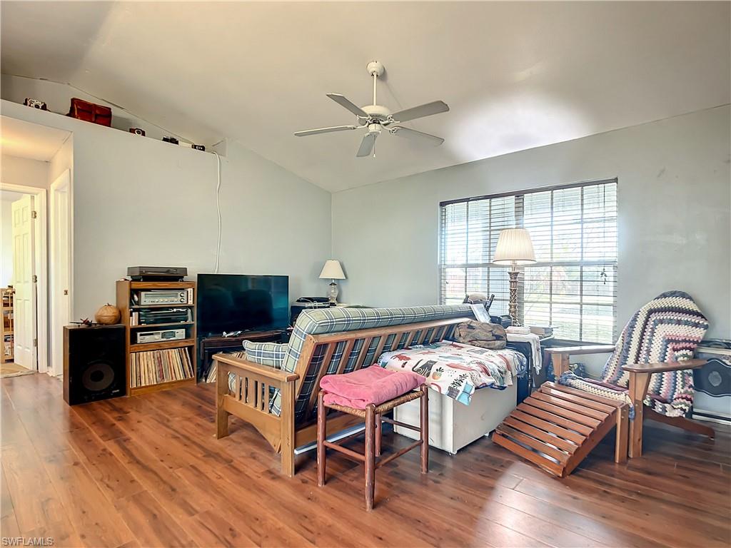 18282 Fern Road Fort Myers, FL 33967 - Photo 6 of 24 a bedroom with a bed and a desk