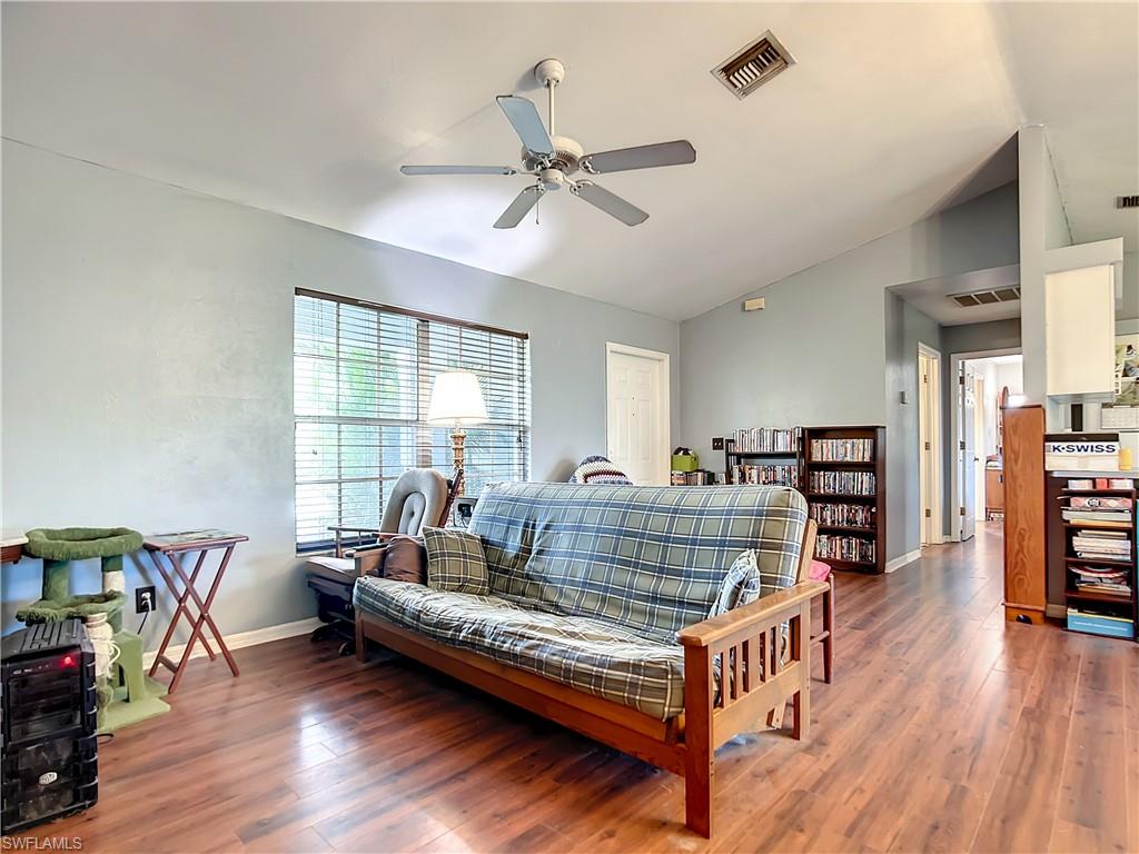 18282 Fern Road Fort Myers, FL 33967 - Photo 7 of 24 a living room with furniture and a wooden floor
