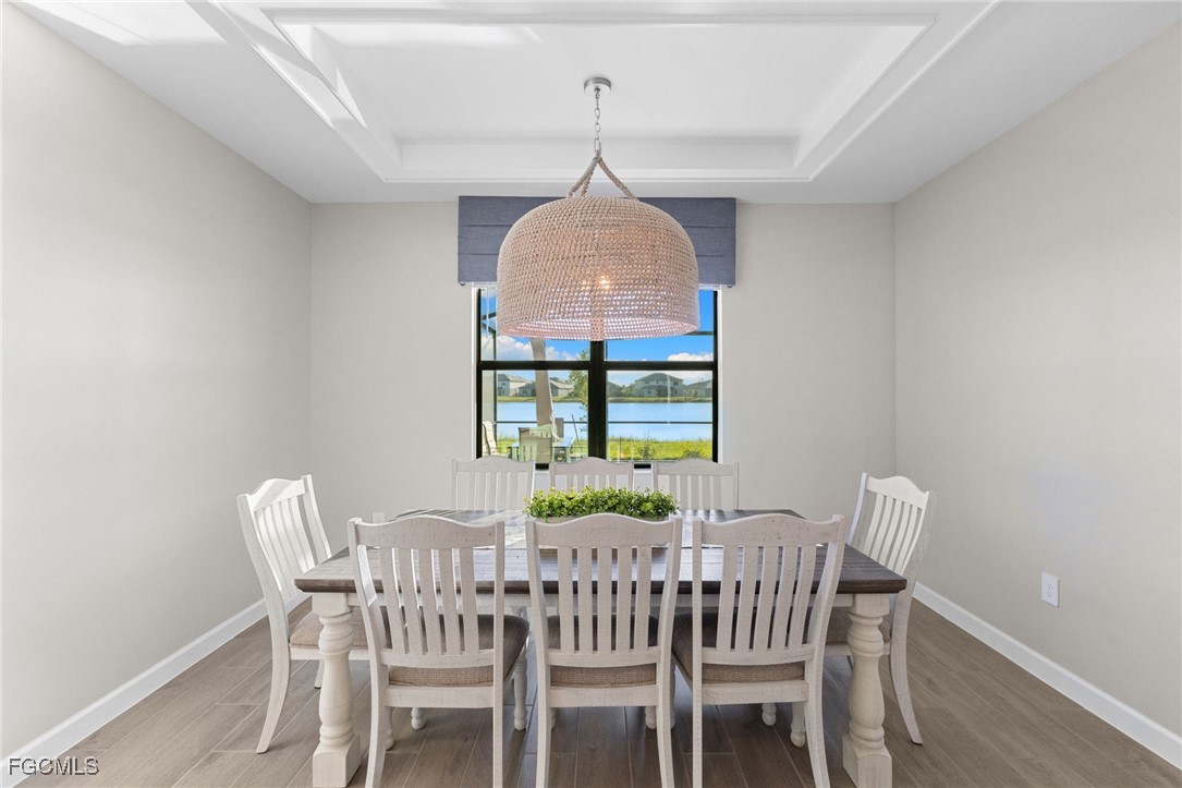 10575 Timber Creek Drive Fort Myers, FL 33913 - Photo 21 of 50 a view of a dining room with furniture window and outside view