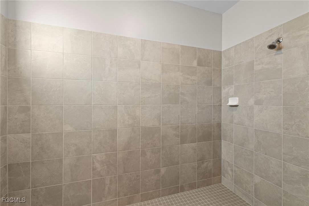 10575 Timber Creek Drive Fort Myers, FL 33913 - Photo 41 of 50 a bathroom with a shower