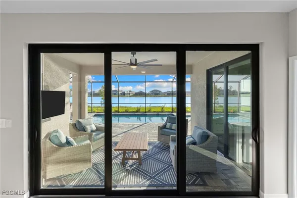 a view of living room and floor to ceiling window