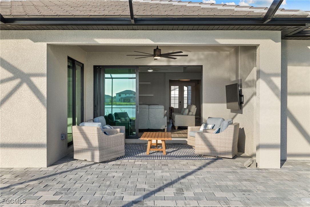 10575 Timber Creek Drive Fort Myers, FL 33913 - Photo 47 of 50 a living room with furniture and a fireplace