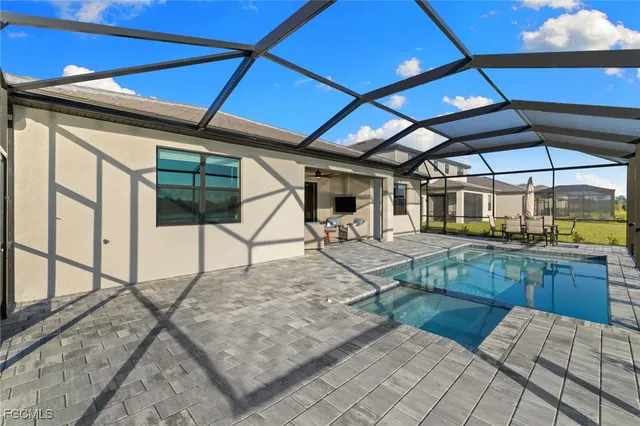 a view of a backyard of a house