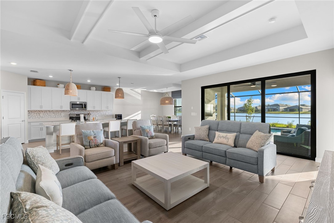 10575 Timber Creek Drive Fort Myers, FL 33913 - Photo 5 of 50 a living room with furniture and a large window