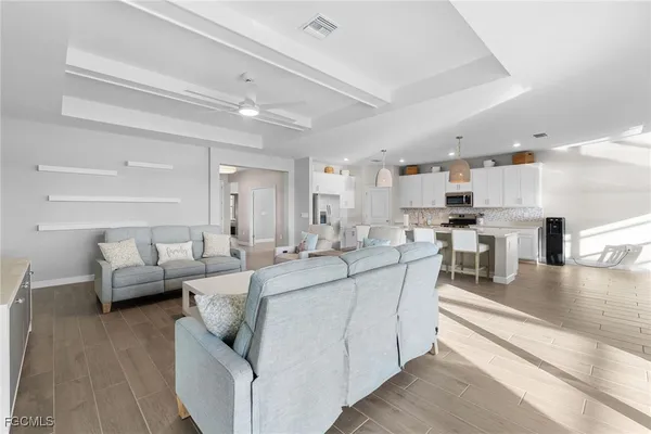 a living room with furniture and a table