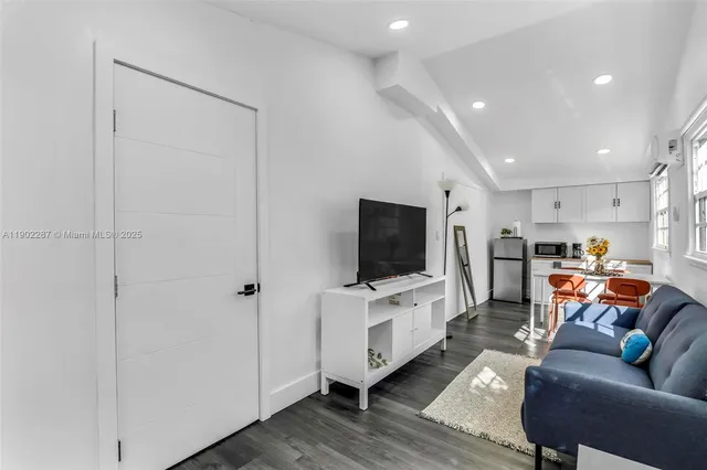 a house with a yard and a outdoor seating