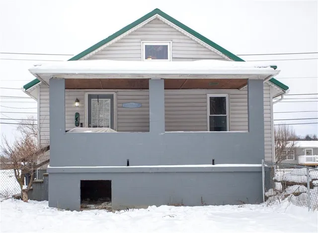 a view of house with outdoor space