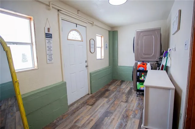 a room with furniture and a window