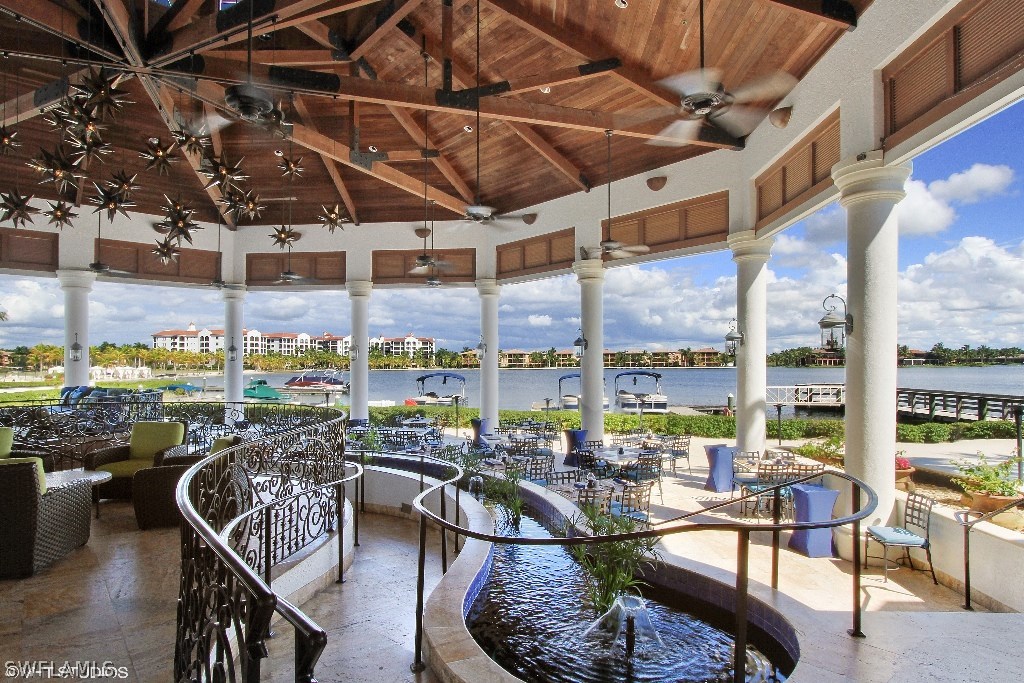 10110 Valiant Court, Unit 101 Fort Myers, FL 33913 - Photo 19 of 25 a view of a swimming pool with outdoor seating