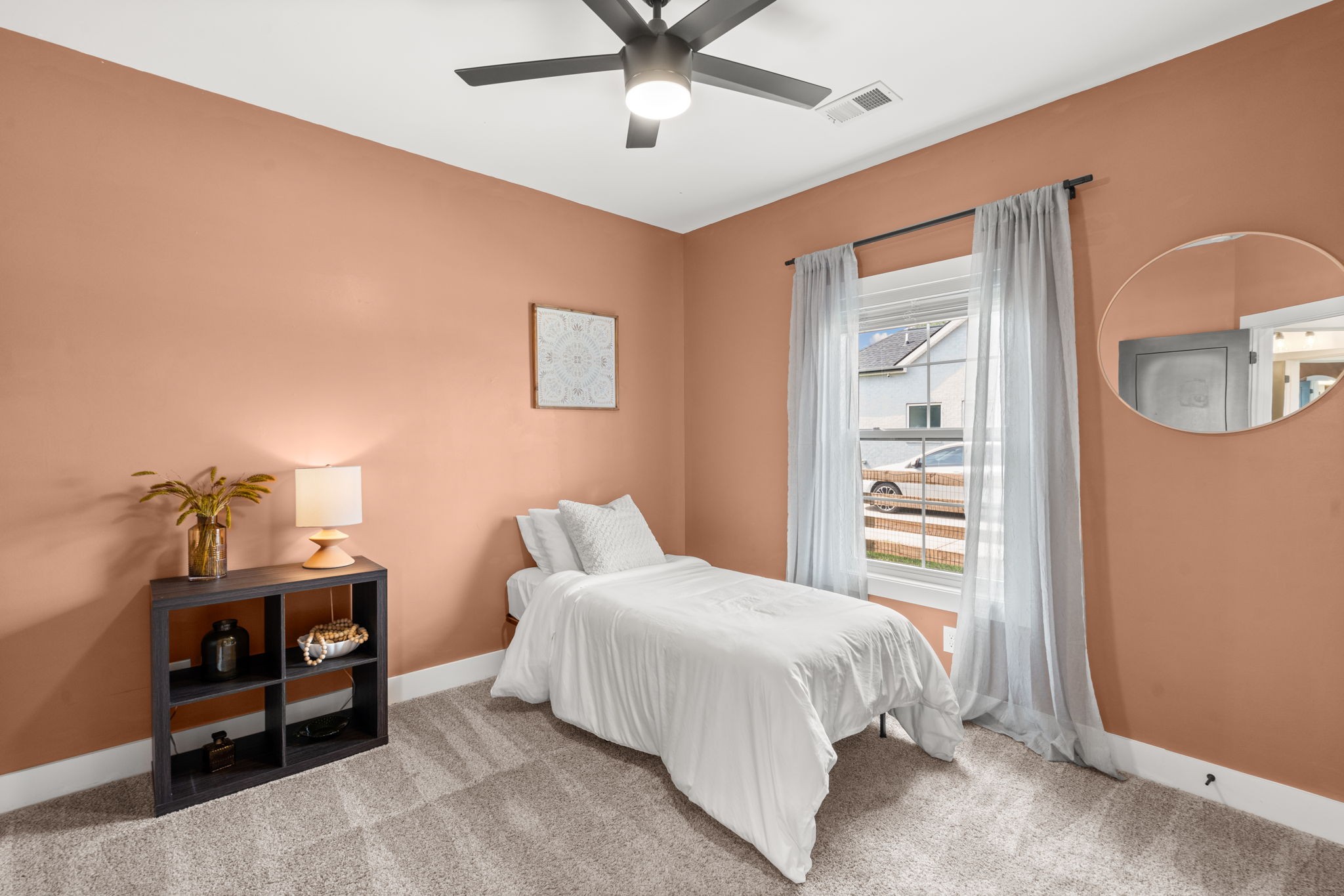 6560 Murfreesboro Road Lebanon, TN 37090 - Photo 26 of 43 a bedroom with a bed and a chandelier