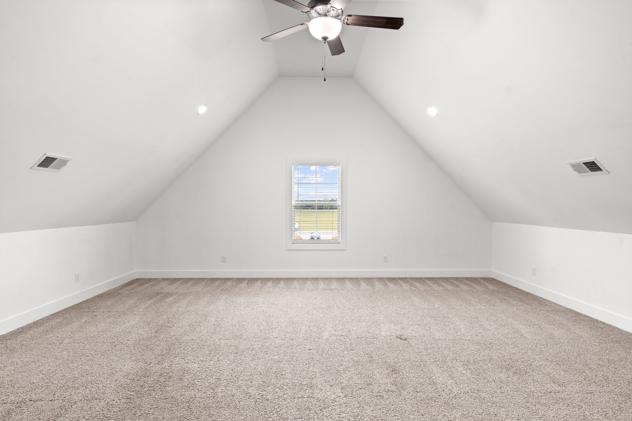 6560 Murfreesboro Road Lebanon, TN 37090 - Photo 31 of 43 an empty room with a ceiling fan and a window