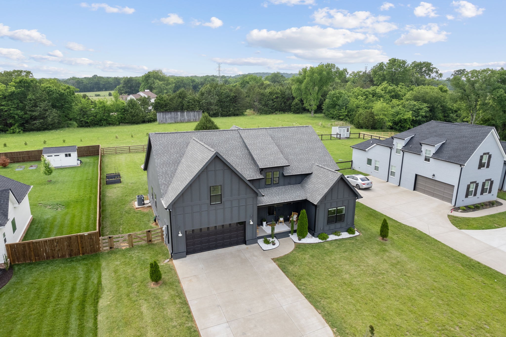 6560 Murfreesboro Road Lebanon, TN 37090 - Photo 4 of 43 an aerial view of a house with swimming pool and a yard