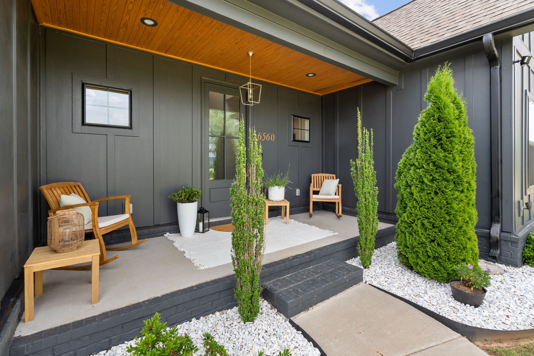 6560 Murfreesboro Road Lebanon, TN 37090 - Photo 6 of 43 a front view of a house with outdoor seating