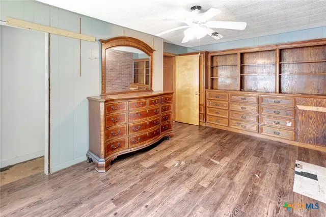 a room with furniture and wooden floor