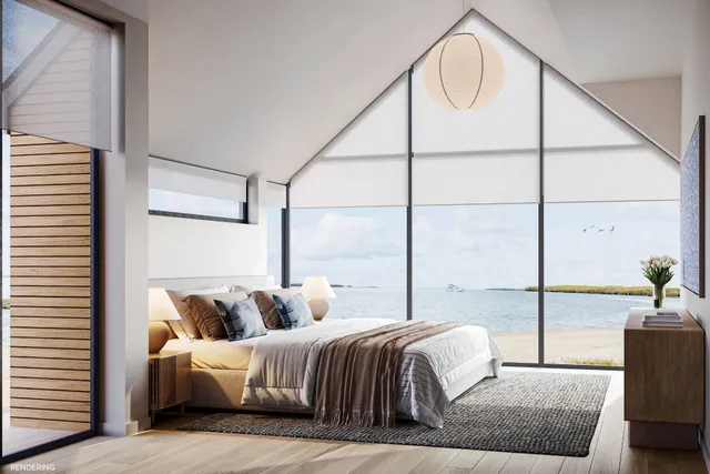 a bedroom with bed and a window