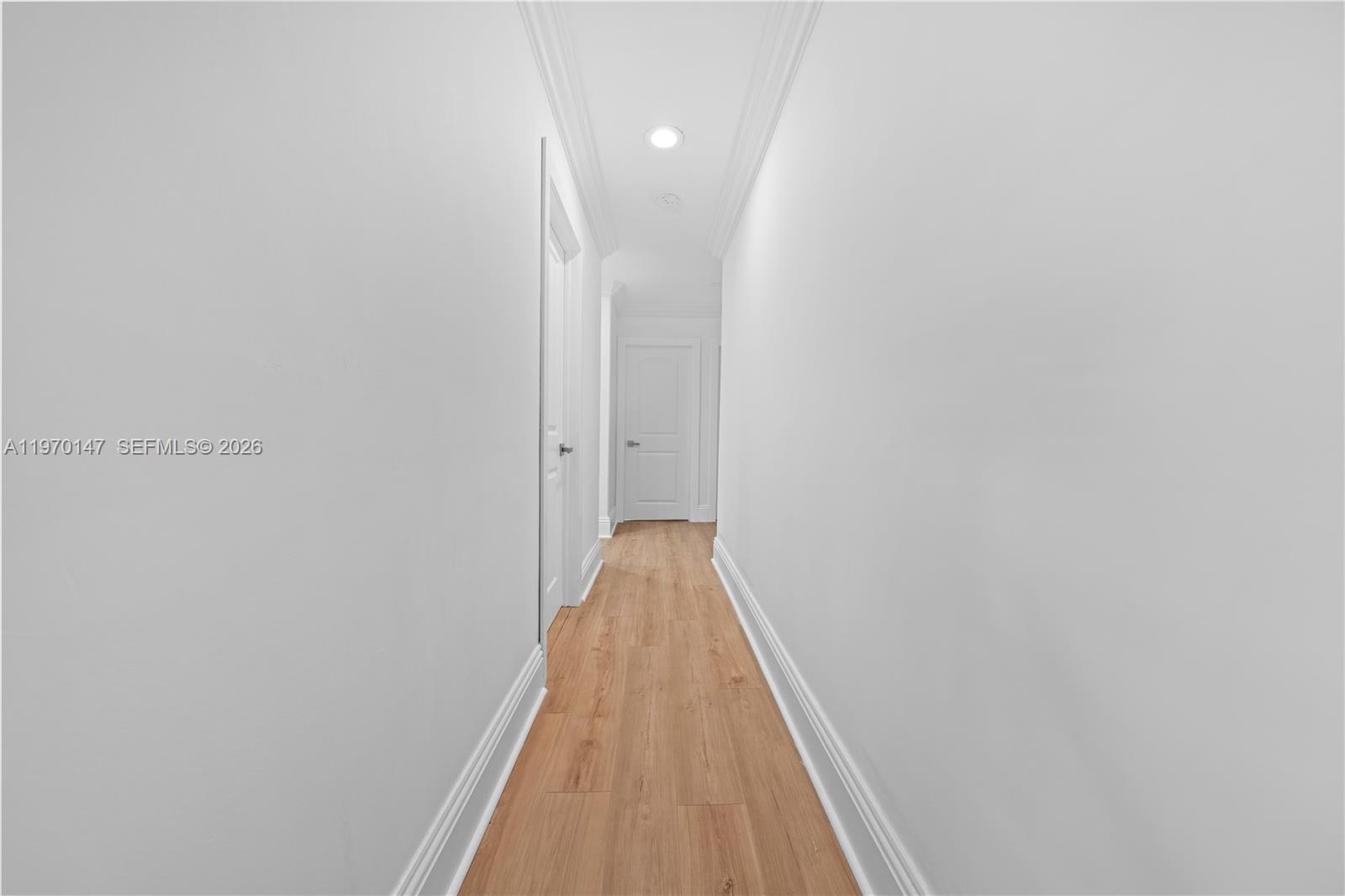 8801 Southwest 124th Street Miami, FL 33176 - Photo 16 of 48 a view of hallway with wooden floor