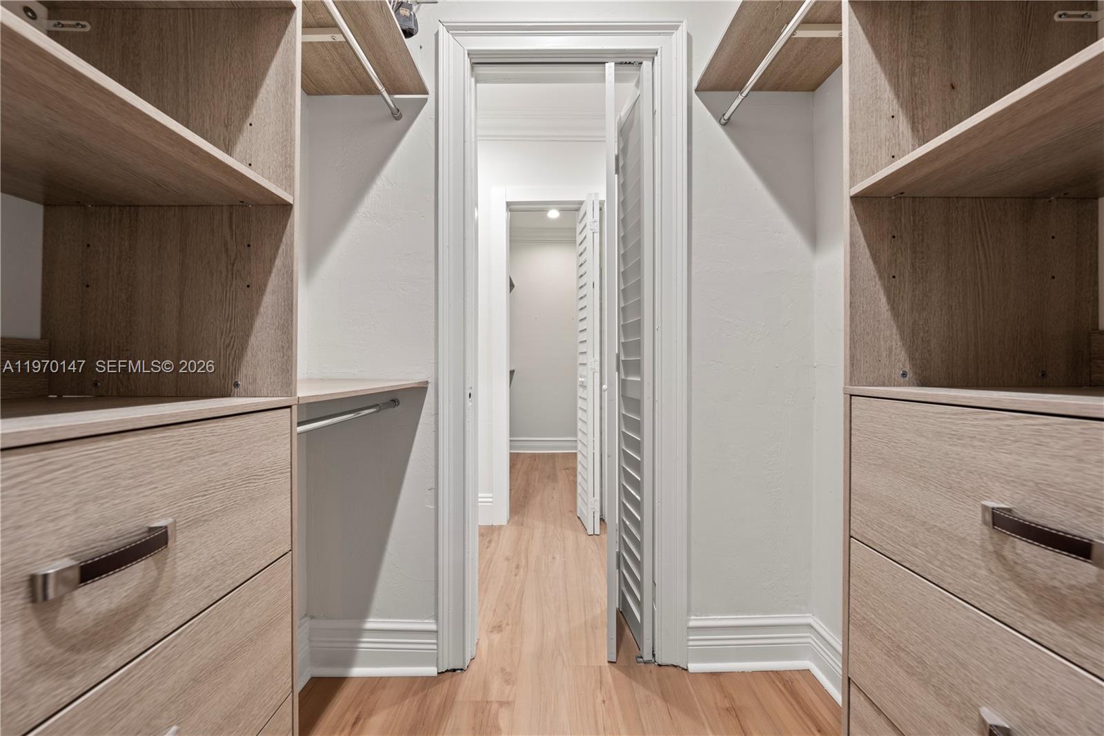 8801 Southwest 124th Street Miami, FL 33176 - Photo 24 of 48 a view of a hallway with wooden floor and staircase