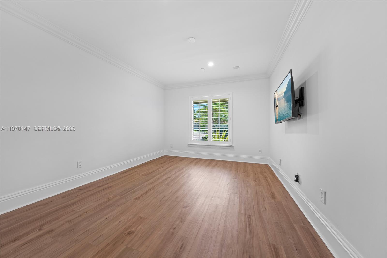8801 Southwest 124th Street Miami, FL 33176 - Photo 30 of 48 wooden floor in an empty room with a window