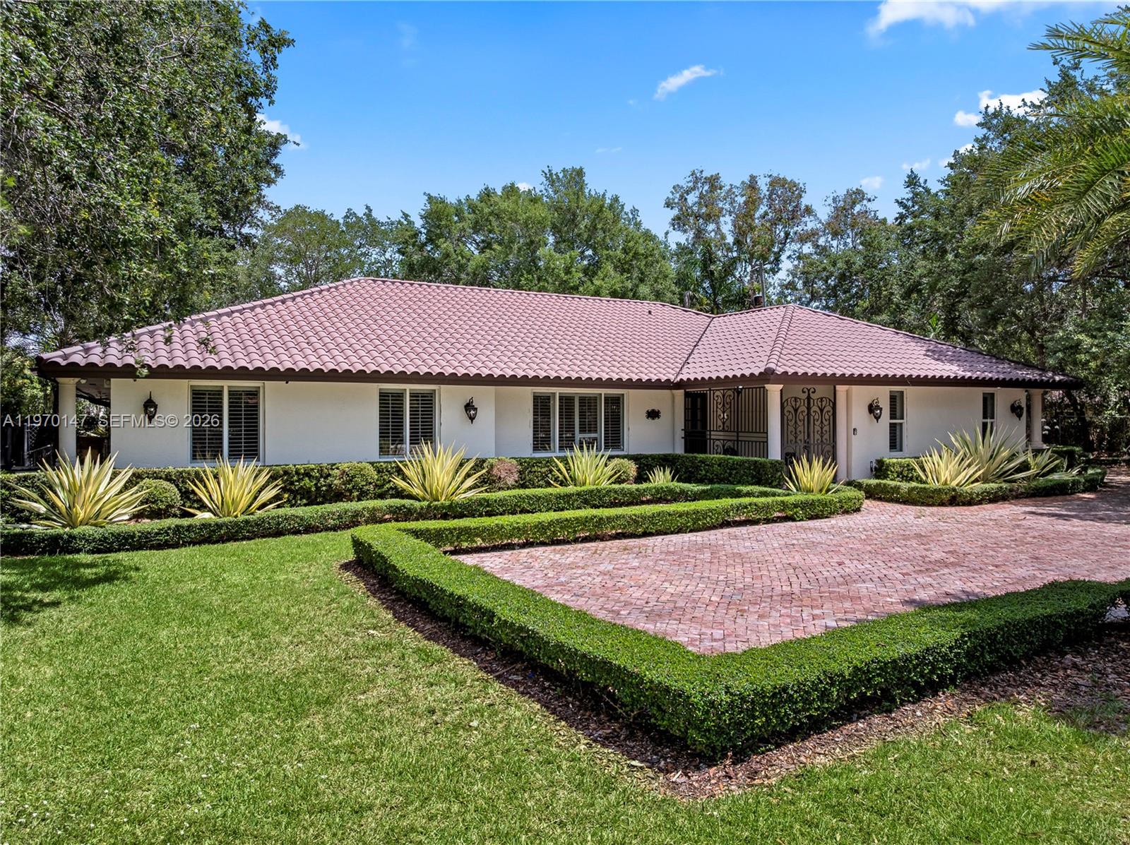 8801 Southwest 124th Street Miami, FL 33176 - Photo 3 of 48 a view of a house with swimming pool and yard