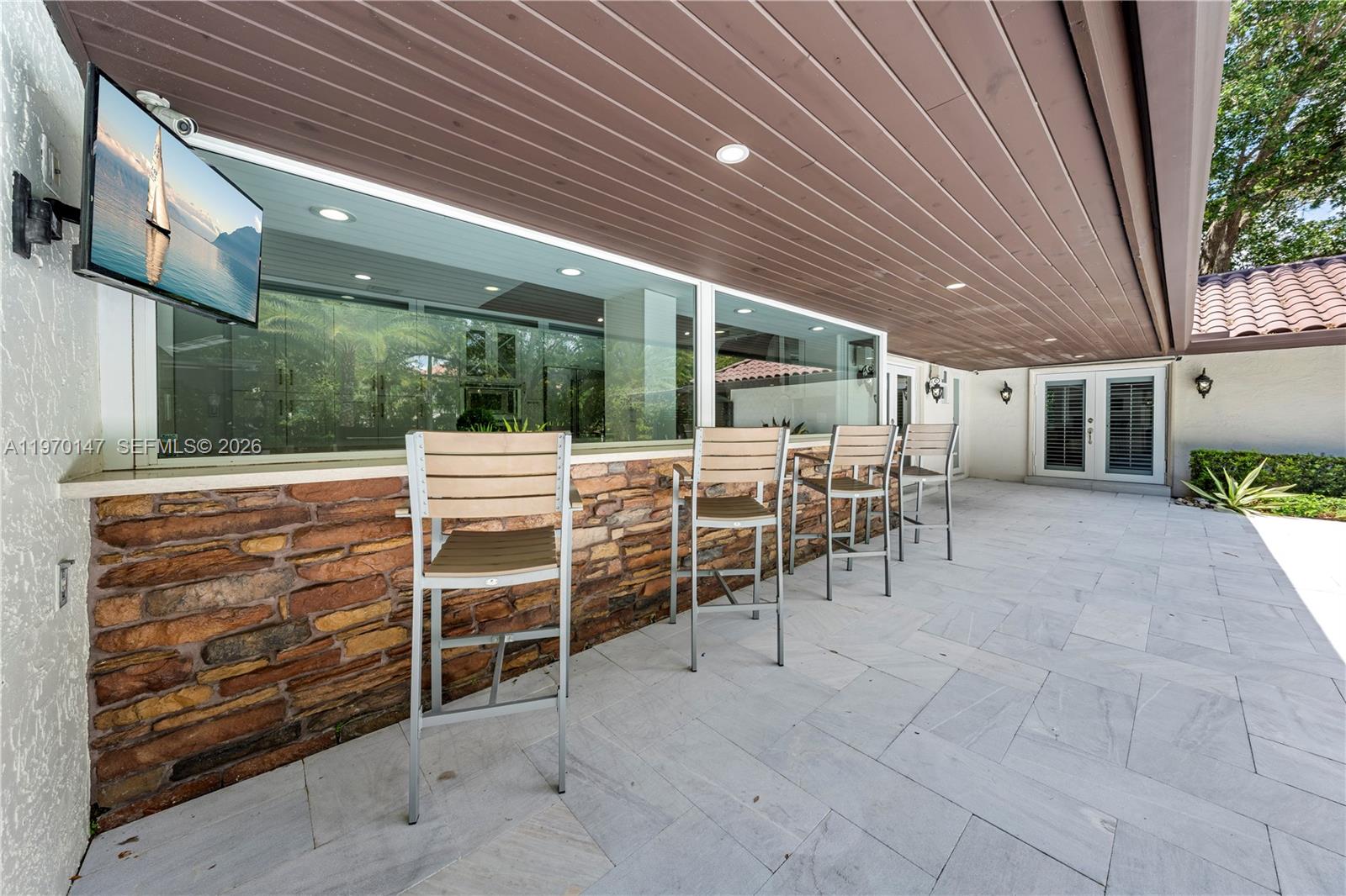 8801 Southwest 124th Street Miami, FL 33176 - Photo 33 of 48 a view of a chairs and table in the patio