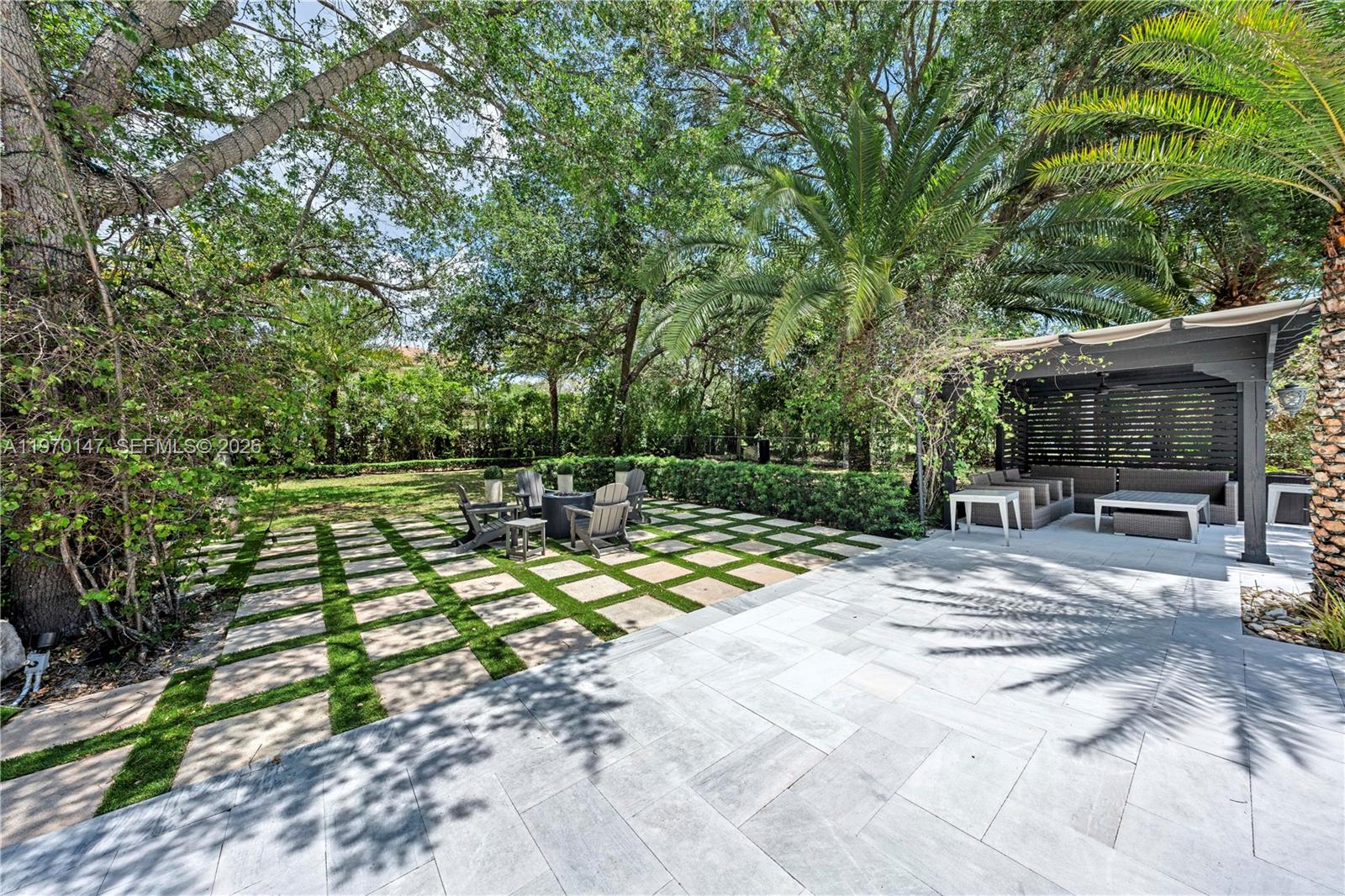 8801 Southwest 124th Street Miami, FL 33176 - Photo 37 of 48 a view of backyard with a sitting area