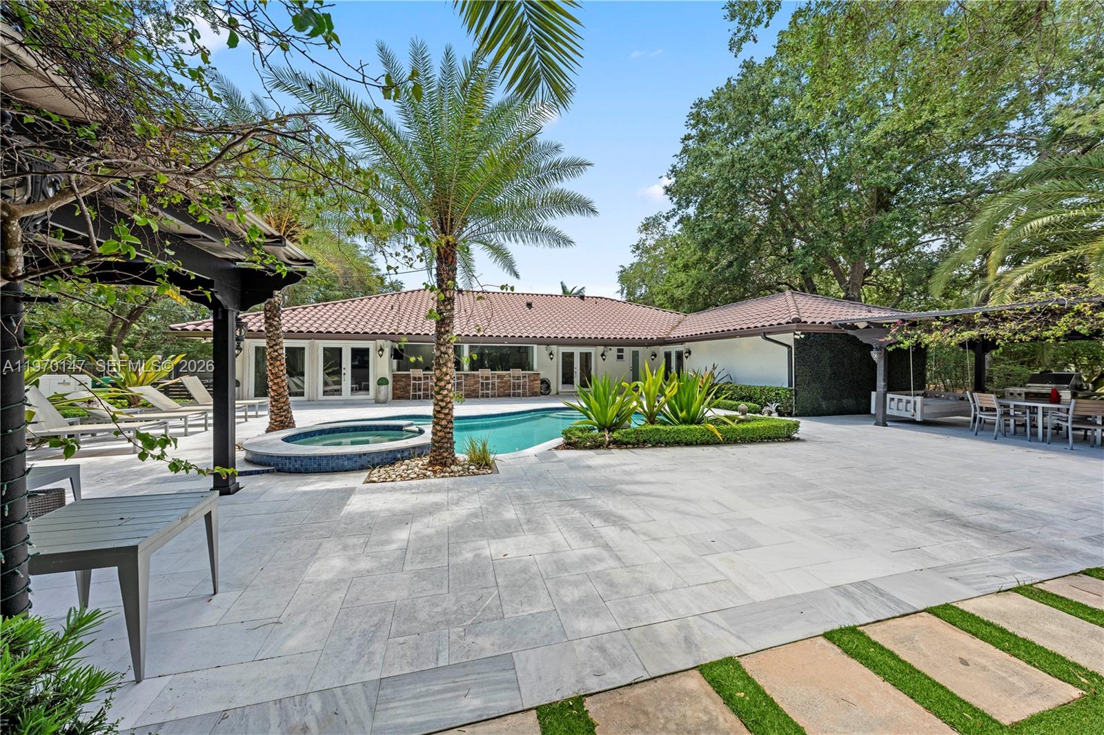 8801 Southwest 124th Street Miami, FL 33176 - Photo 38 of 48 a view of house with outdoor space and sitting area