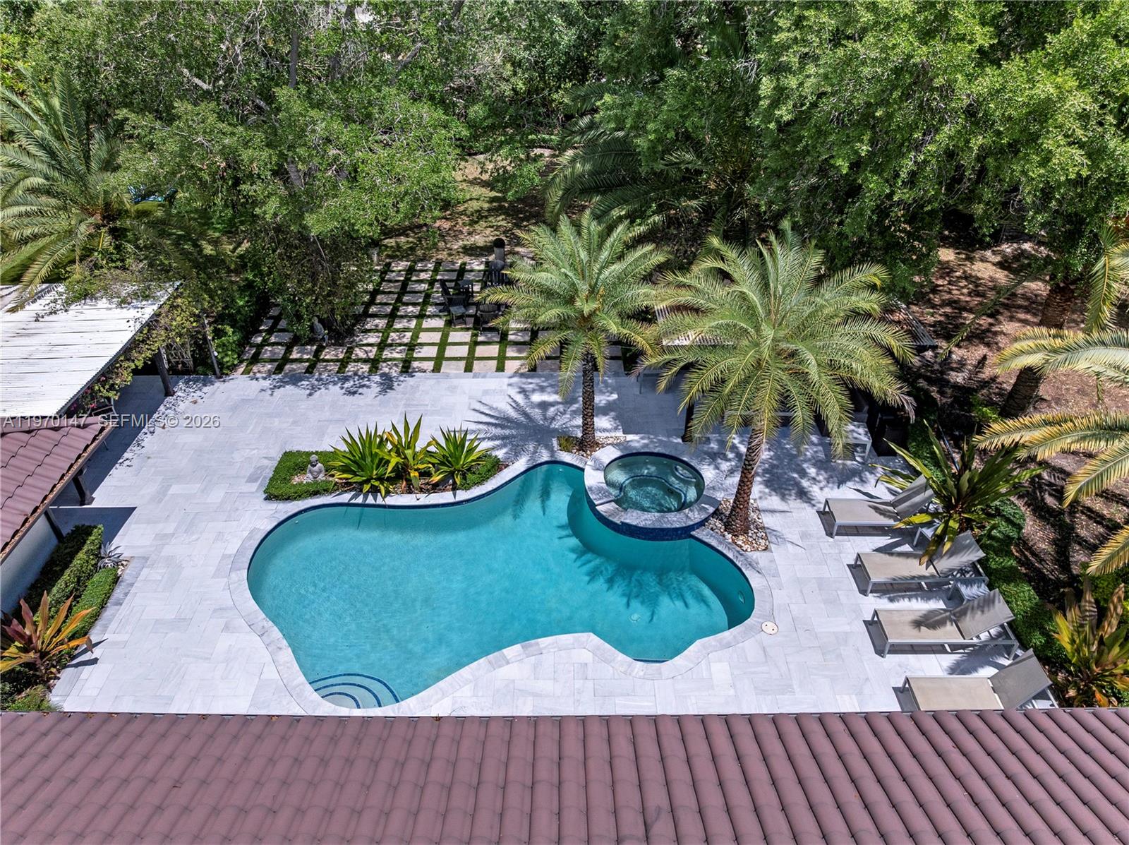 8801 Southwest 124th Street Miami, FL 33176 - Photo 39 of 48 a view of a swimming pool with a patio
