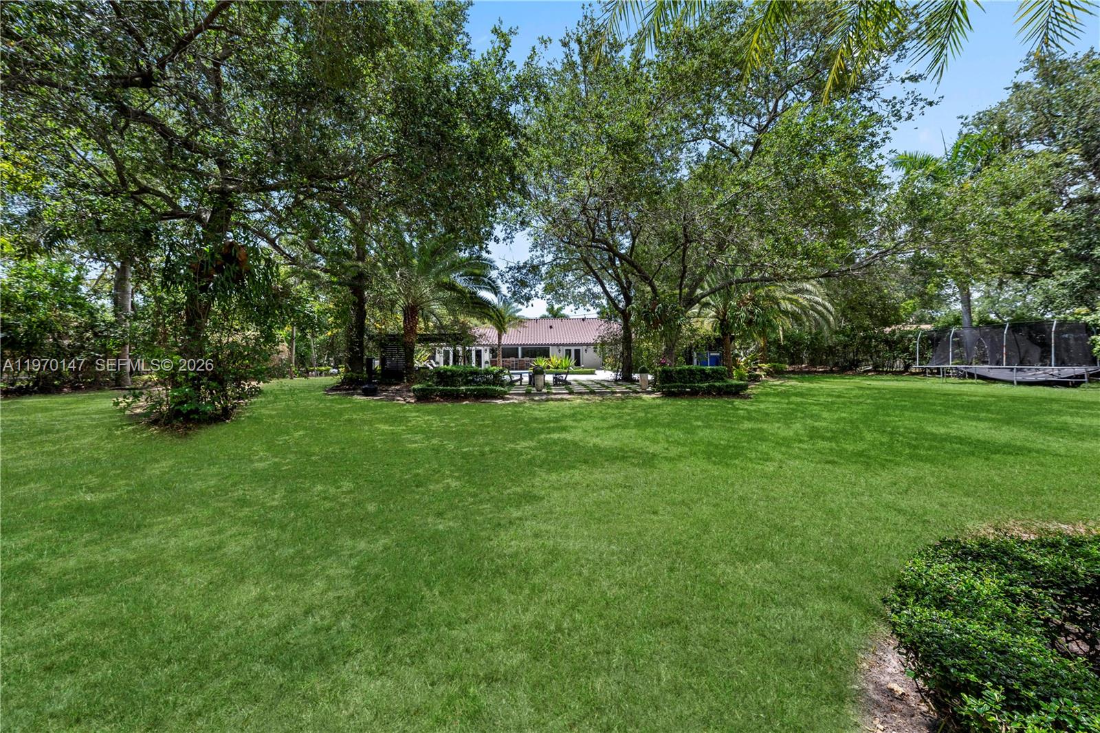 8801 Southwest 124th Street Miami, FL 33176 - Photo 42 of 48 a view of a park with large trees